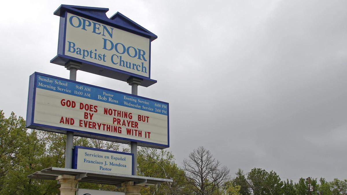 The pastor of Open Door Church in Mesquite was arrested Tuesday on charges that he covered up allegations of sexual abuse.