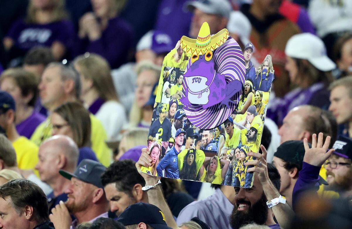 A TCU fan holds up a hypnatoad at the Vrbo Fiesta Bowl at State Farm Stadium in Glendale, Ariz., on Saturday, December 31, 2022.