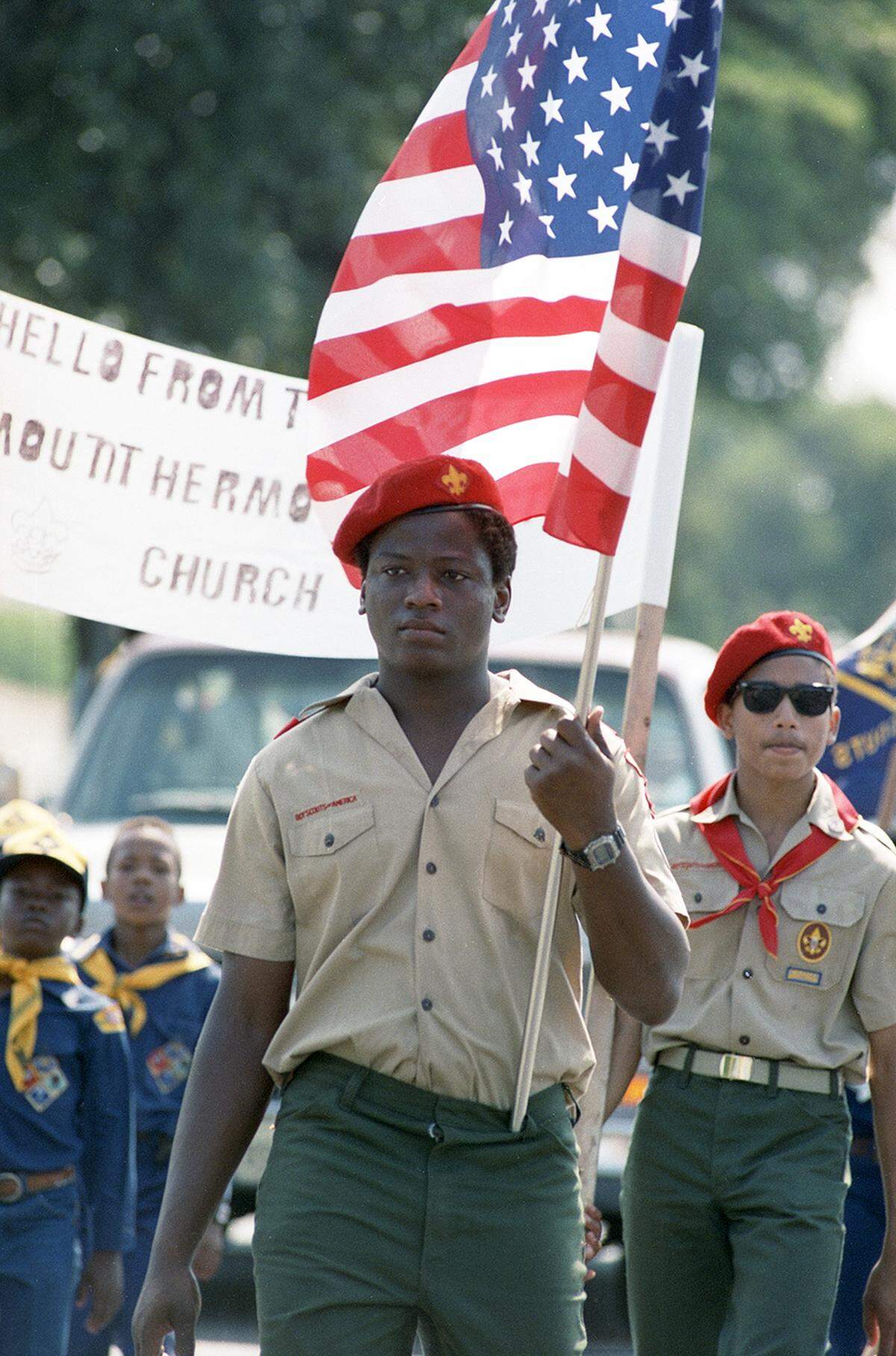 June 18, 1988: Boy Scout John Rawls leads a group of Scouts in the Juneteenth parade along Rosedale in Fort Worth.