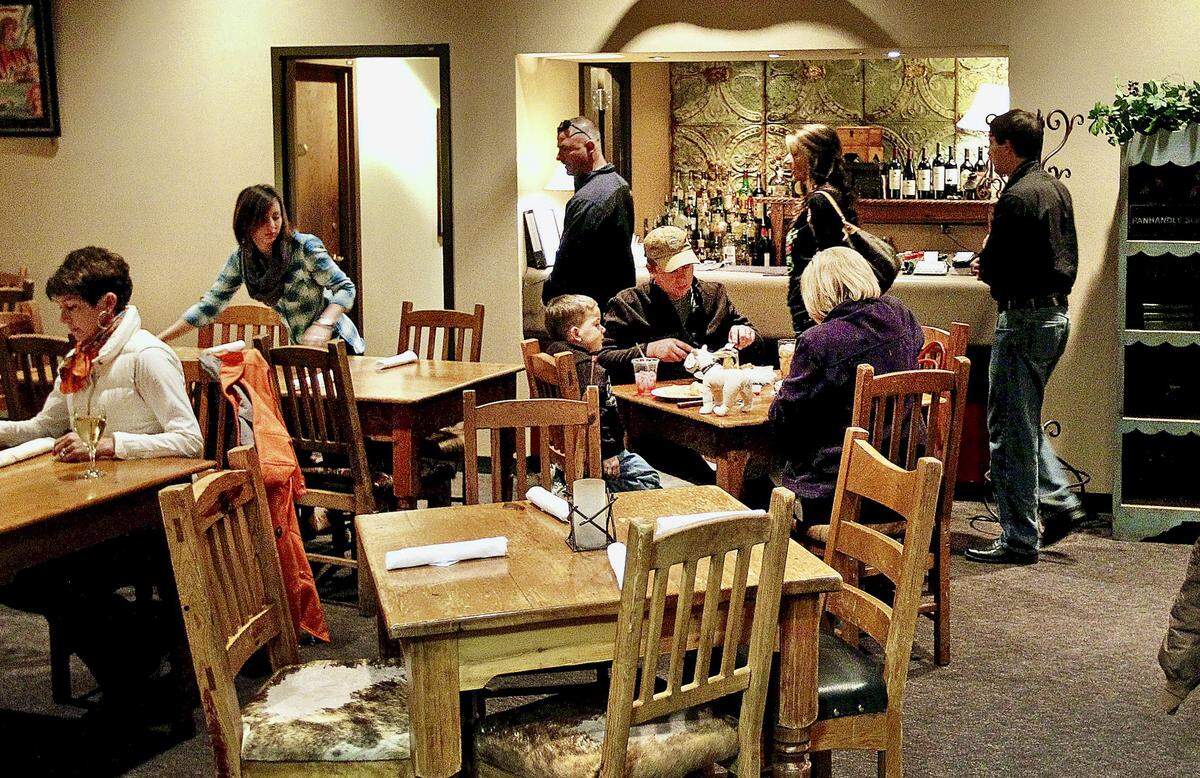 Diners relax while having lunch at Reata at the Rodeo in Fort Worth, Texas during the Fort Worth Stock Show and Rodeo. The Reata is one of the few “sit-down” dining options at the Stock Show.