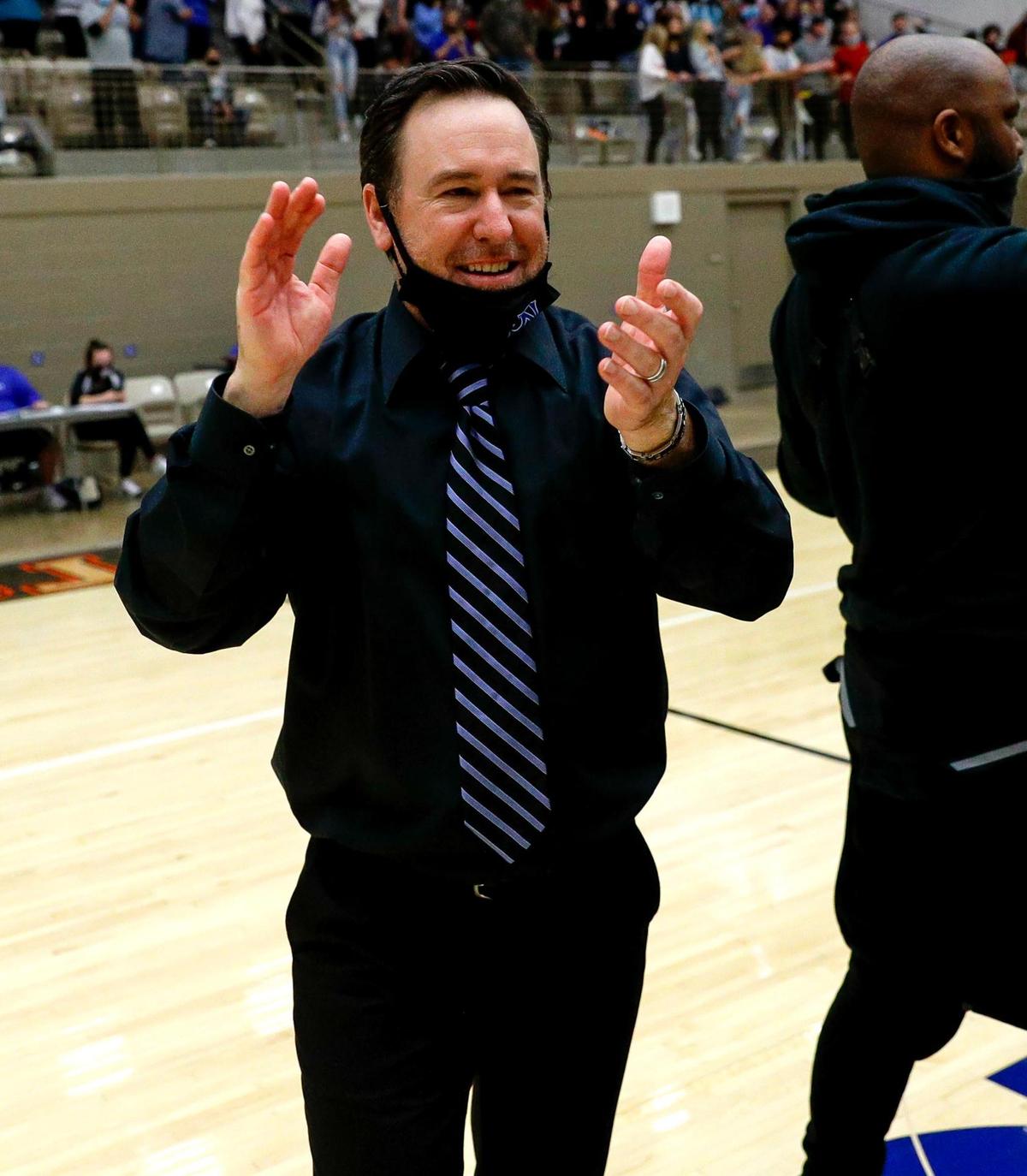 Byron Nelson head coach Scott Curran celebrates a victory against North Crowley, 72-70 in overtime, Friday, February 26, 2021 of a 6A Region 1 Quarterfinal High School playoff Basketball game played at the Thomas Coliseum in Haltom City, Tx. (Steve Nurenberg Special to the Star-Telegram)
