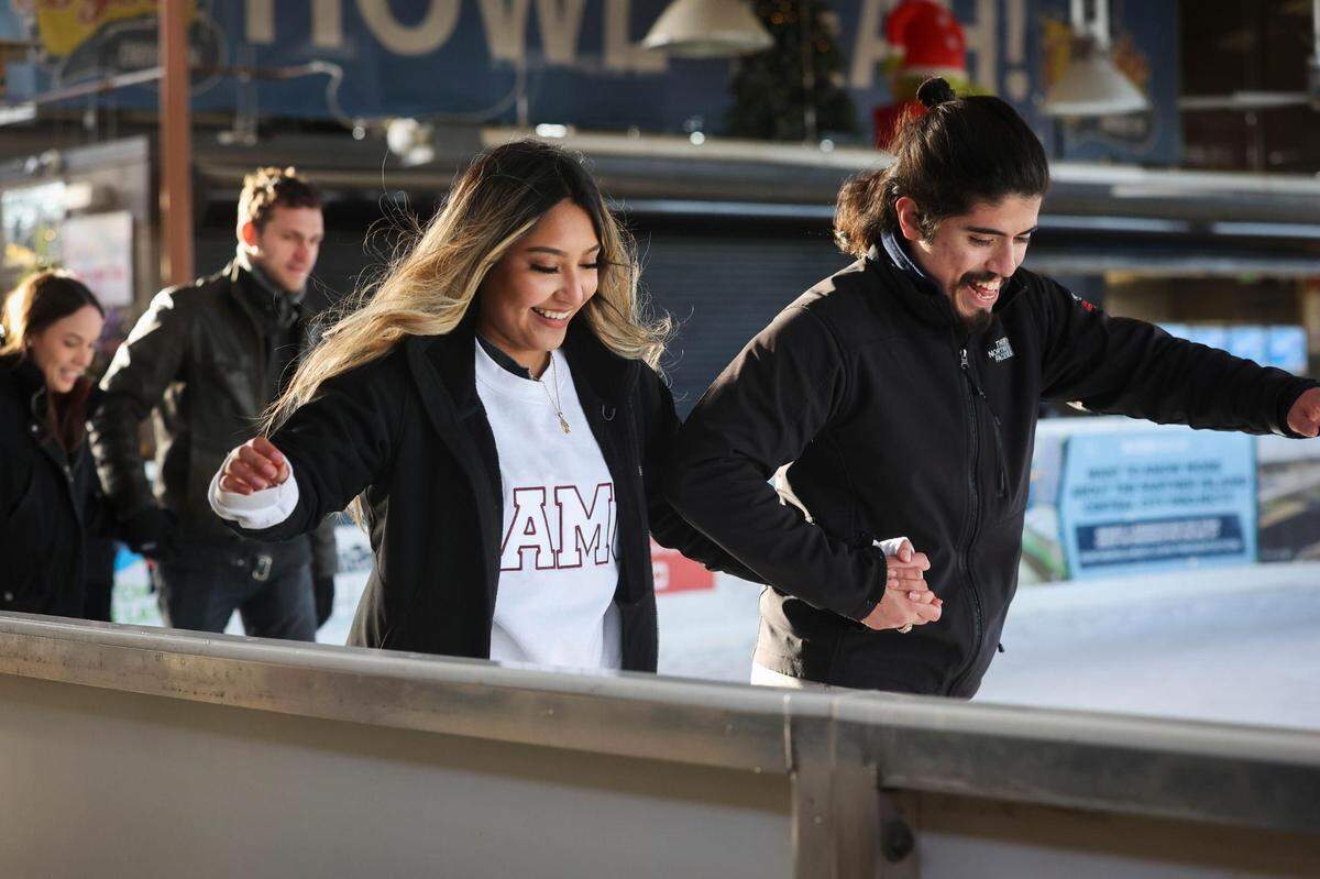 Sergio Alonzo and Selena Cruz skate amid a COVID surge Thursday, Jan. 6, 2022, at Panther Island Ice in Fort Worth.