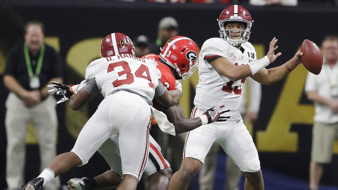 This Jan. 8, 2018, file photo shows Alabama quarterback Tua Tagovailoa dropping back to pass during the second half of the NCAA College Football Playoff championship game against Georgia in Atlanta.
