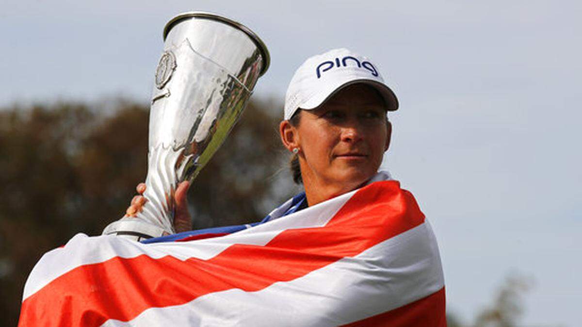 Former TCU and Boswell star Angela Stanford poses with her trophy after winning the Evian Championship women’s golf tournament in Evian, eastern France, Sunday, Sept. 16, 2018. At the age of 40, it’s her first major title. (AP Photo/Francois Mori)