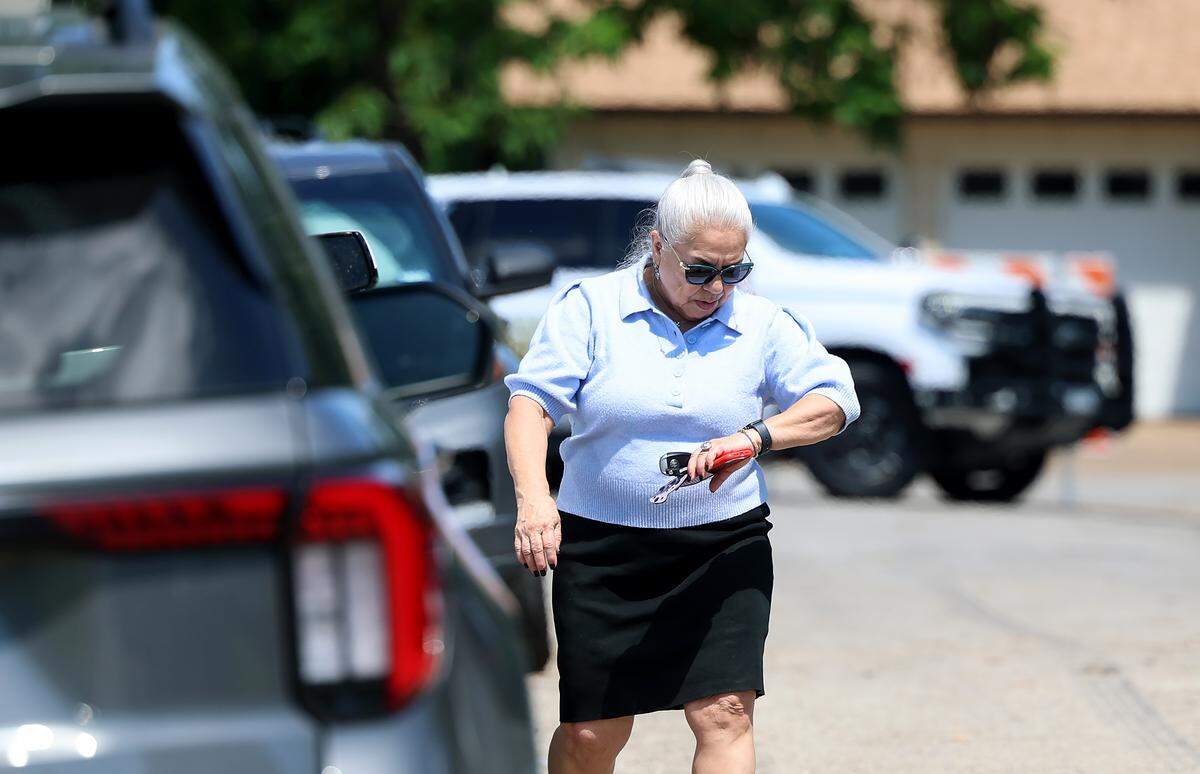 Rose Anna Salinas with the Tarrant County District Attorney’s Office leaves the former Everman home of Cindy Rodriguez-Singh, the mother of missing 6-year-old Noel Rodriguez-Alvarez on Tuesday, May 12, 2026.