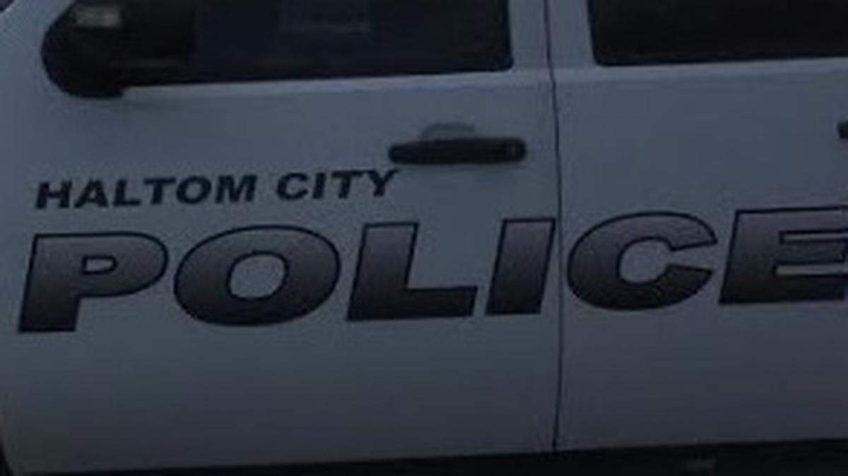 Two Haltom City police officers and a resident were hospitalized after they were involved in a crash early Thursday, police said.