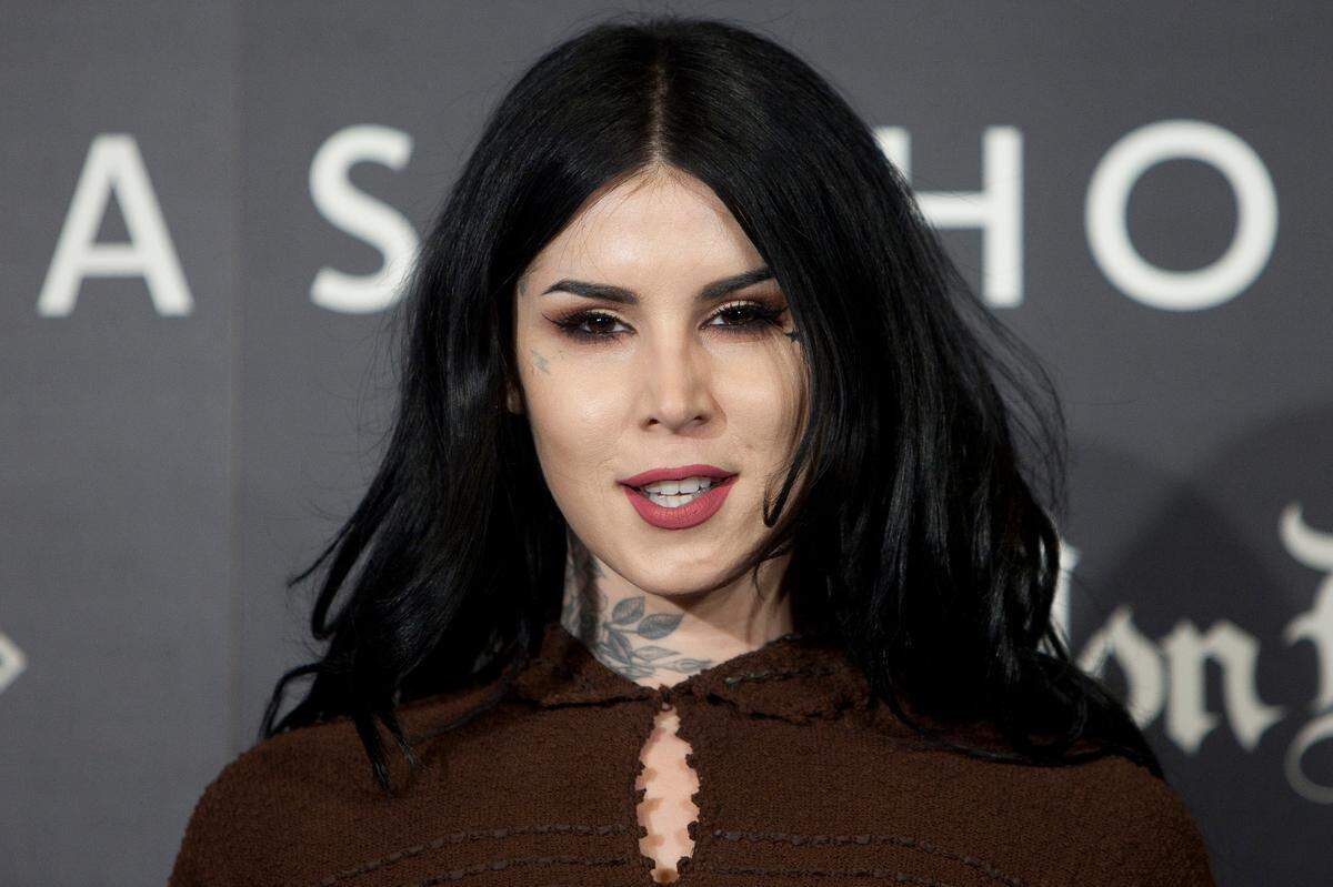 US tattoo artist Kat Von D poses for photographers during the presentation of her new line of makeup in Madrid, Spain, Wednesday, Oct. 7, 2015. (AP Photo/Abraham Caro Marin)