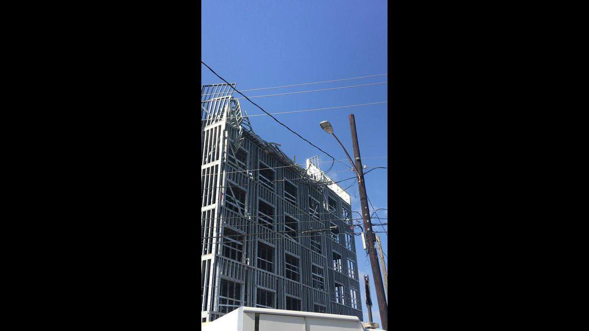A building partially collapsed in Houston on Monday morning, officials say. 