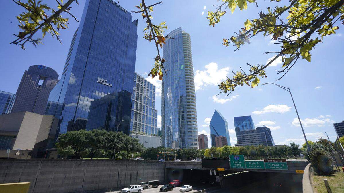 FILE - Light afternoon traffic flows in downtown Dallas, Aug. 12, 2021. Forbes gave “most outstanding” recognition to five restaurants in Texas, including four in Dallas.