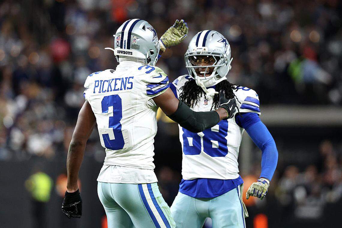 Cowboys wide receivers George Pickens (3) and CeeDee Lamb celebrate a touchdown during the second quarter against the Raiders on Monday at Allegiant Stadium in Las Vegas.