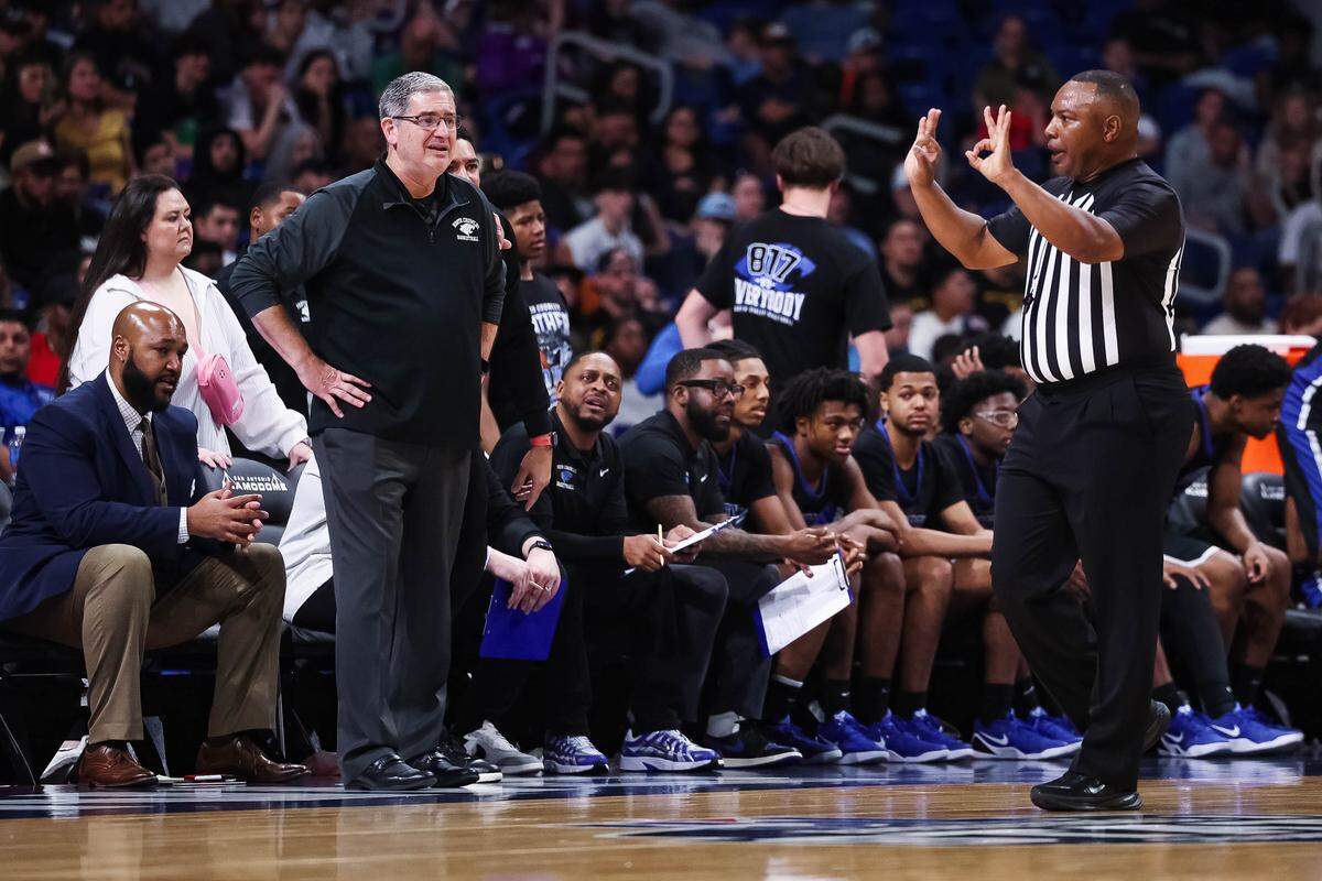 North Crowley head coach Tommy Brakel stands in disbelief as an official makes a foul call in the Class 6A Division I state championship against San Antonio Brennan on Saturday at the Alamodome in San Antonio.
