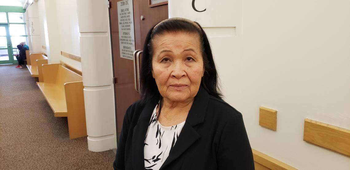 Phong Moore, the alleged victim in an elder fraud case, awaits a jury decision on whether her daughter would be convicted of stealing her identity. Jurors found her daughter not guilty.