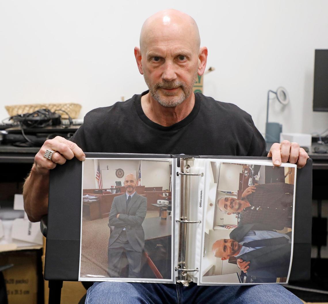 Former Fort Worth police officer Brian Franklin shows a page from his photo book during an interview with the Star-Telegram in Fort Worth, Texas, on June 23, 2023. The photo on the left is his favorite in all of the book. It is a photo of him in the courtroom less than 30 minutes after he was exonerated.