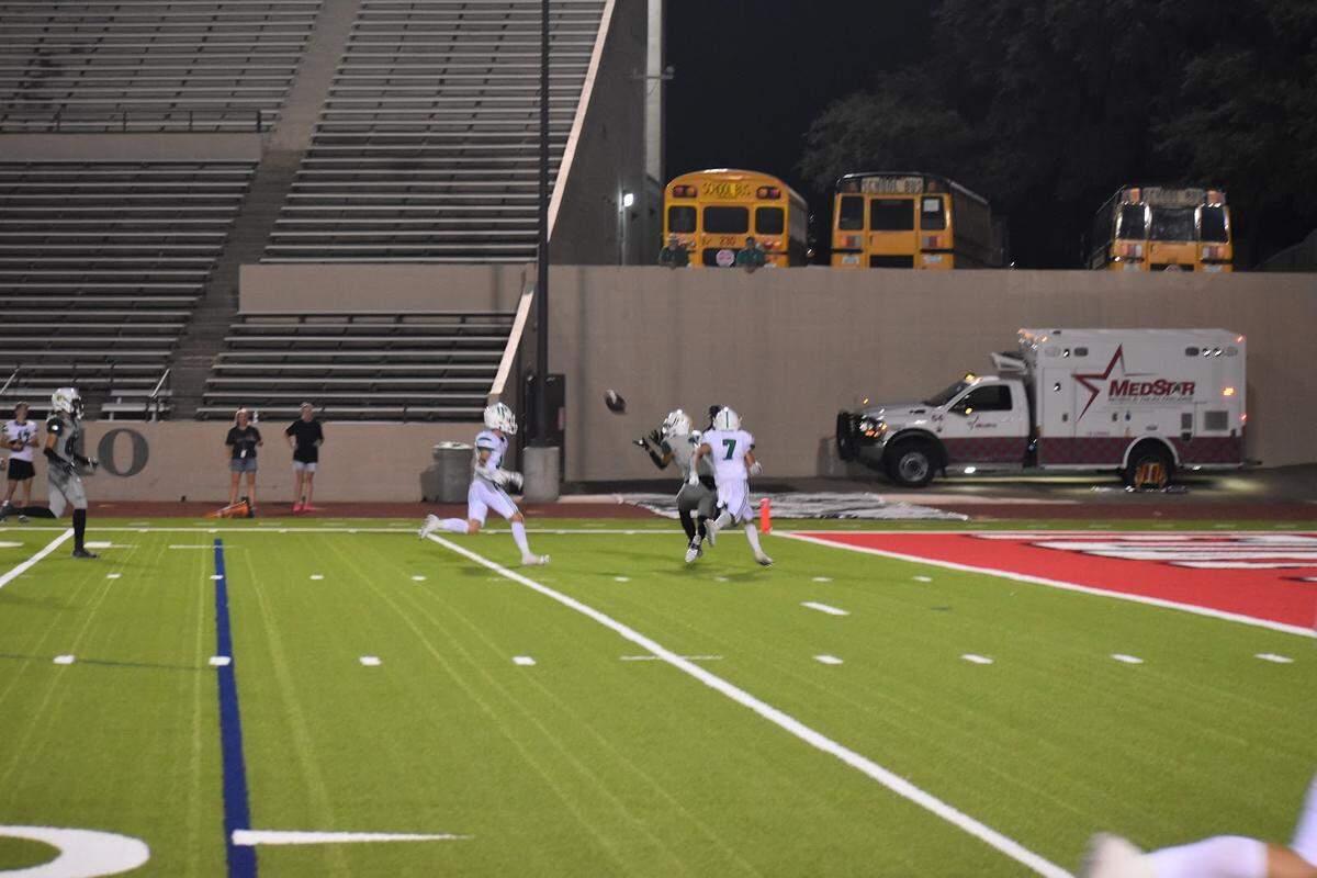 Benbrook’s Lucas Jackson (11) scores the game-winning touchdown for the Bobcats in overtime during a high school football game against Iowa Park at Farrington Field in Fort Worth, Texas Thursday, August 31, 2023.