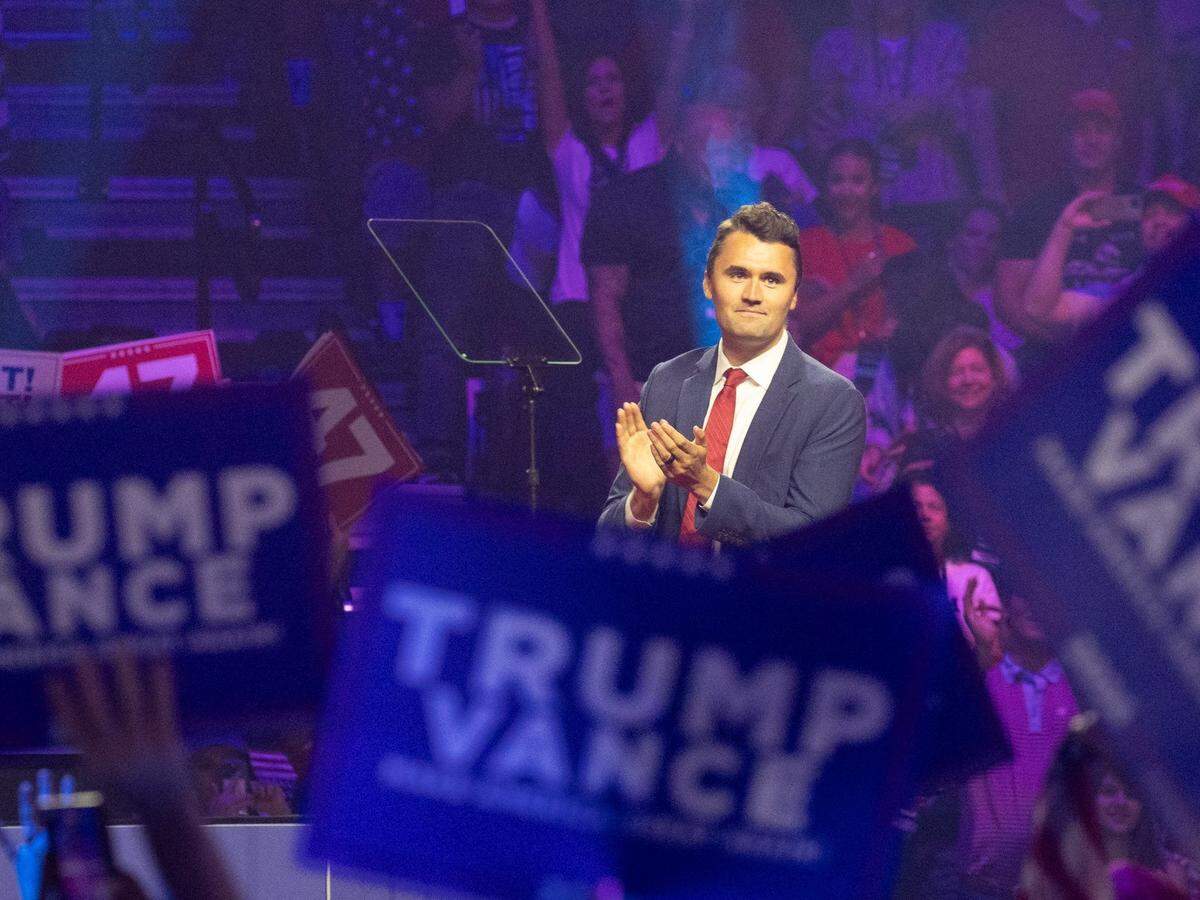 Turning Point USA co-founder Charlie Kirk walks on stage on Aug. 23, 2024, at Desert Diamond Arena in Glendale, Ariz.