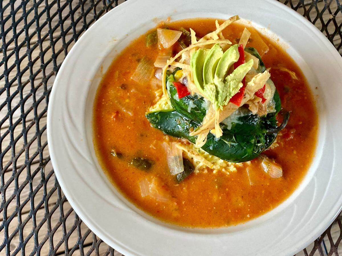 La Choza serves Santa Fe tacos, but the signature dish is the “naked” chile relleno stuffed with meat or chicken over ranchero sauce.