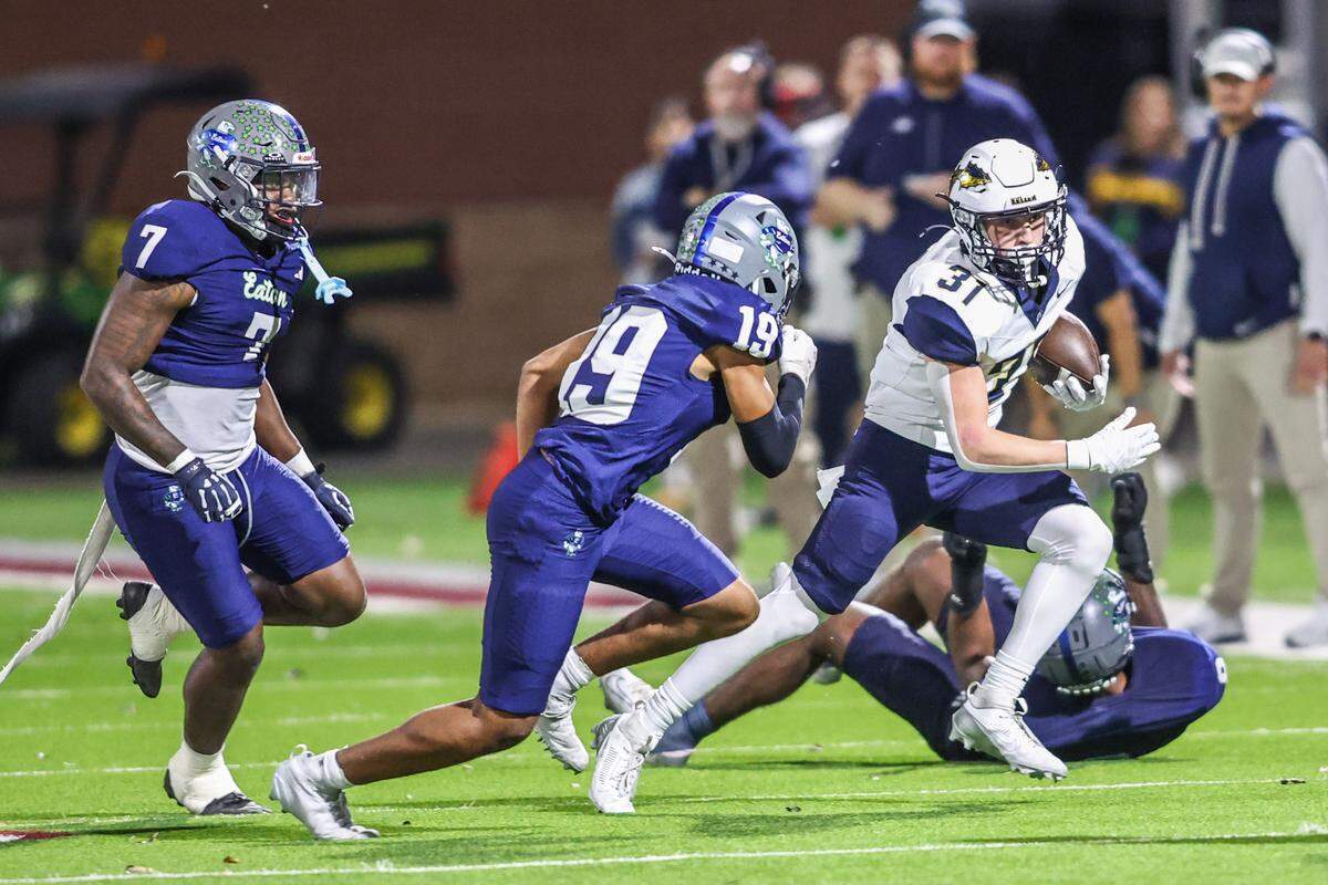 Keller’s Blake Dyniewski (31) is chased down by Eaton’s Caden Tavarez (19) in the Friday, game at Northwest ISD Stadium. Tom Marvin / Special to the Star-Telegram