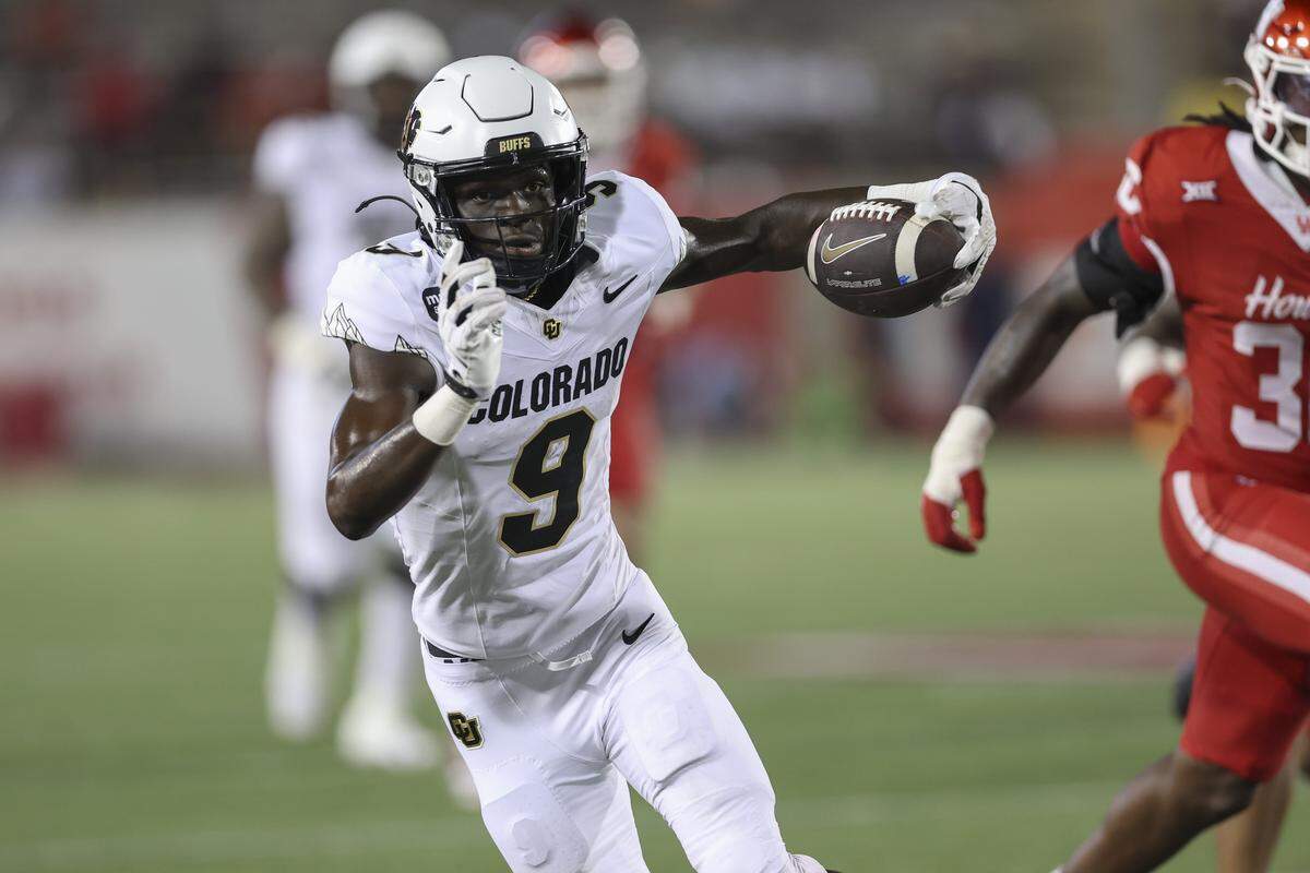 Sep 12, 2025; Houston, Texas, USA; Colorado Buffaloes wide receiver Sincere Brown (9) runs with the ball during the fourth quarter against the Houston Cougars at TDECU Stadium. Mandatory Credit: Troy Taormina-Imagn Images