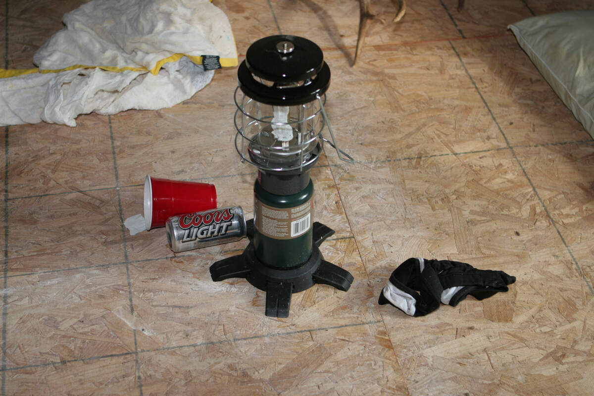 Amber Wyatt’s sports bra on the floor of the loft area of the shed in Arlington where she reported she was raped, in a 2006 police evidence photo.