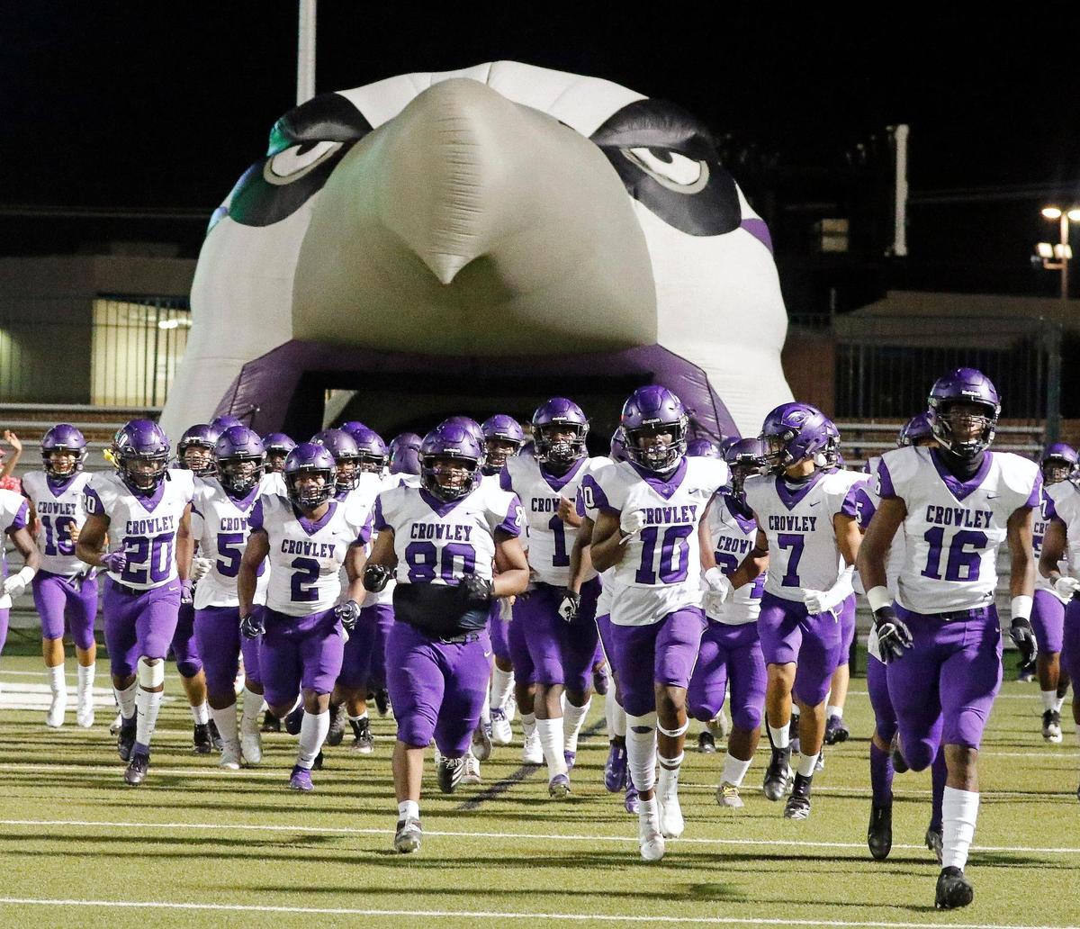 Crowley Eagles take the field for the second half during a high school football game at Birdville FAAC in North Richland Hills, Texas, Friday, Oct. 09, 2020. Birdville defeated Crowley 21-14. (Special to the Star-Telegram Bob Booth)