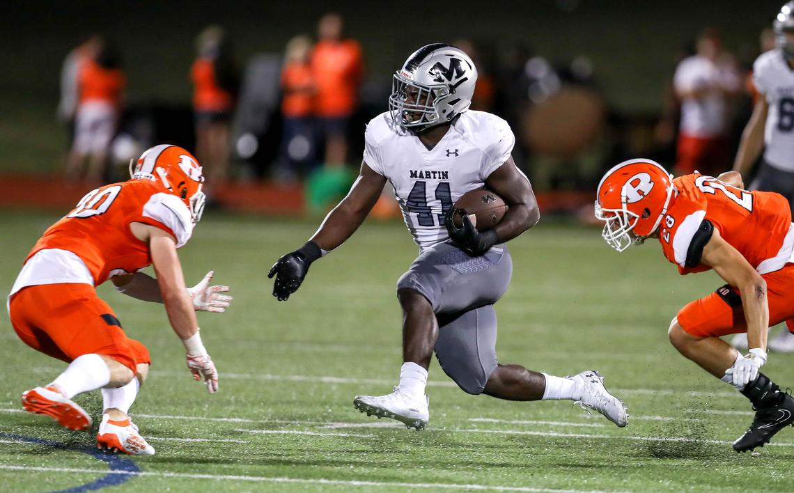Arlington Martin running back Chris Craft (41) has a huge hole to run against Rockwall during the first half, Friday night, September 20, 2019 played at Wilkerson-Sanders Stadium in Rockwall, TX