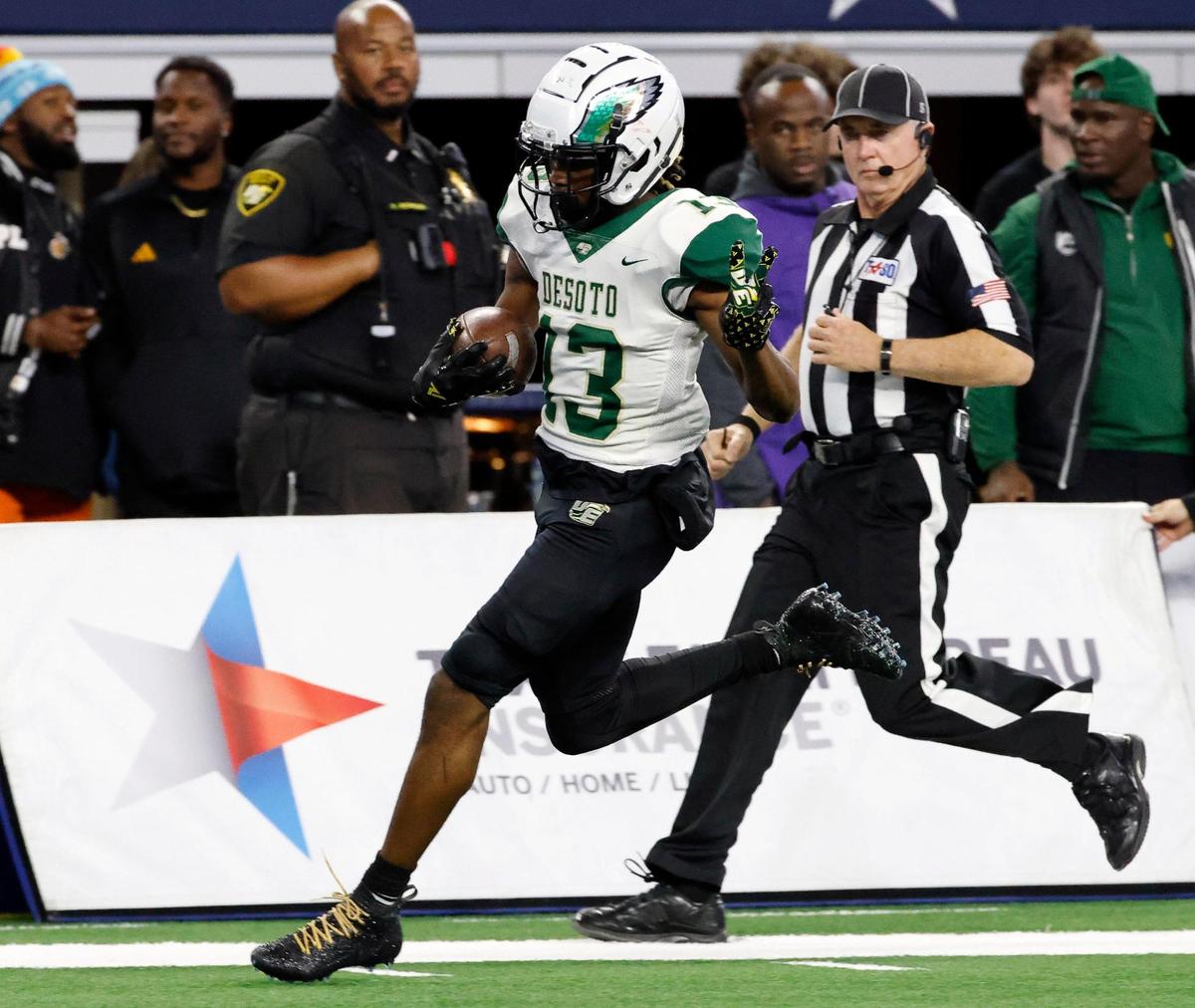 DeSoto wide receiver Daylon Singleton even outruns the officials to the end zone during the first half of the UIL Conference 6A Division 2 state championship football game at AT&T Stadium in Arlington, Texas, Saturday, Dec. 16, 2023.