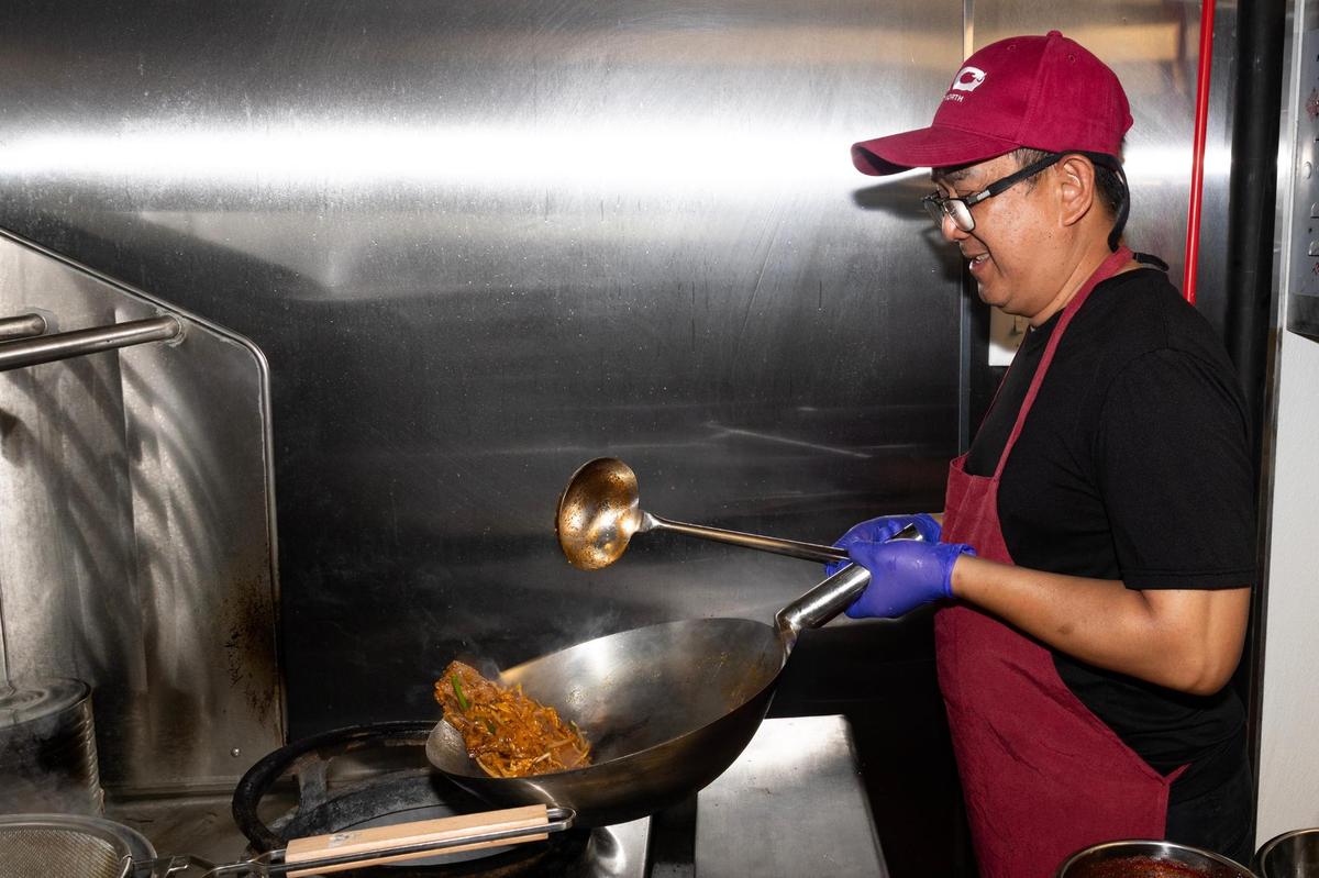 Head Chef Tony Kham prepares pad thai in a wok at the new Ko Thai restaurant on Magnolia Avenue in Fort Worth on Tuesday, April 29, 2025.