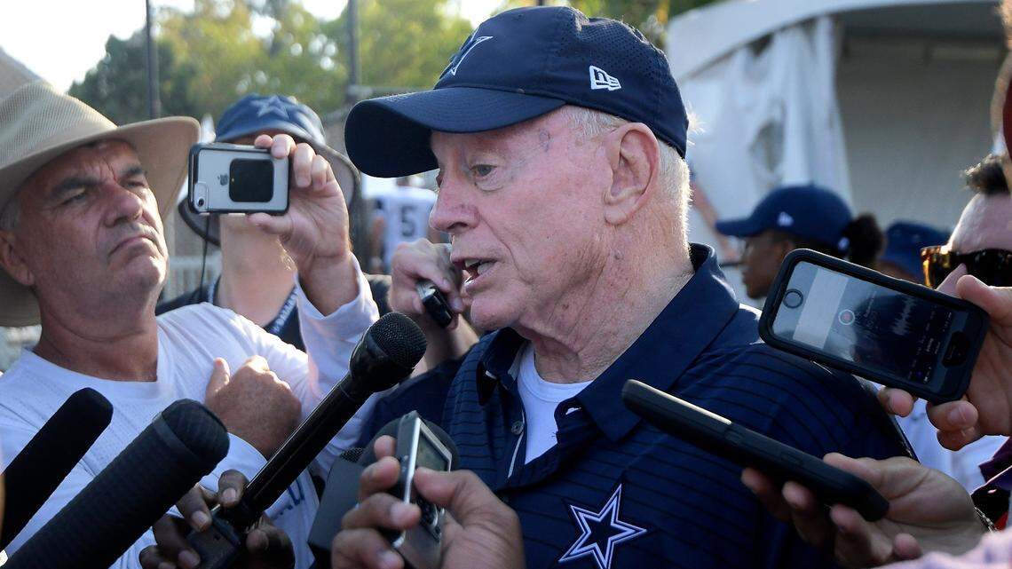 Photo of Cowboys owner Jerry Jones at training camp in Oxnard, California. Jones has stirred controversy by requiring players to stand during the national anthem.