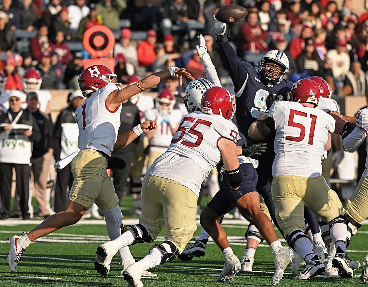 NEW HAVEN, CONNECTICUT - NOVEMBER 22: Jaden Craig #1 of the Harvard Crimson fires a pass over the Yale Bulldogs defense in the second half at Yale Bowl on November 22, 2025 in New Haven, Connecticut. (Photo by Sean D. Elliot/Getty Images)