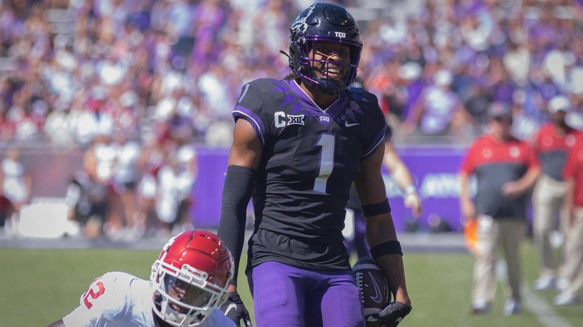 TCU wide receiver Quentin Johnston relaxes between plays during their game against OU at the Amon G. Carter Stadium in Fort Worth, Texas, on Saturday, Oct. 1, 2022.