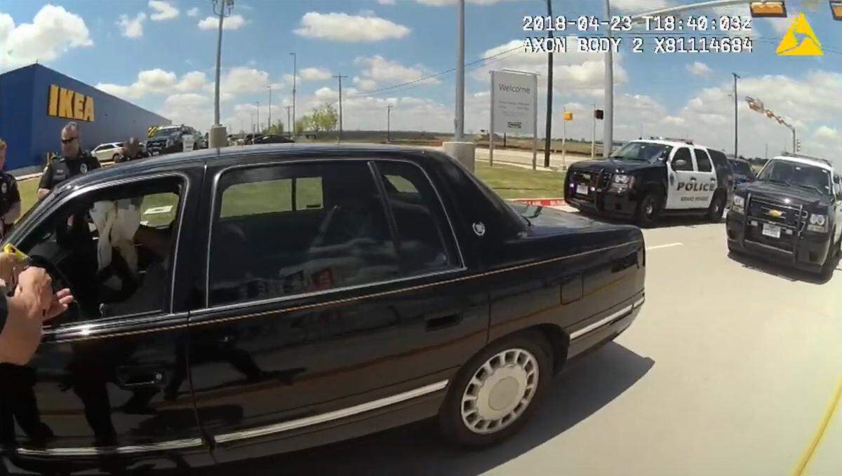 When Carlos High was told to put his hands in the air because he had a rifle in his lap, he did. But when a Grand Prairie police officer rushed the situation by leaning into High’s driver side window, High got spooked and lowered one of his hands. When the officers stepped back, pulled out their guns and began yelling at him, High grabbed the rifle and was shot several times, according to body camera footage.