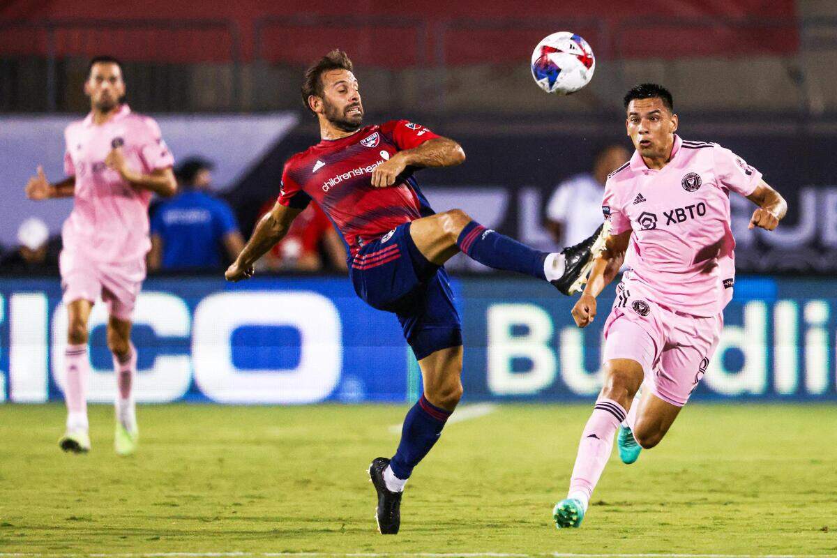 FC Dallas forward Facundo Quignon (5) competes for a ball against Inter Miami CF defender Diego Gomez (8) in the first half of a Leagues Cup match at TOYOTA Stadium in Frisco, Texas on Sunday, Aug. 6, 2023.
