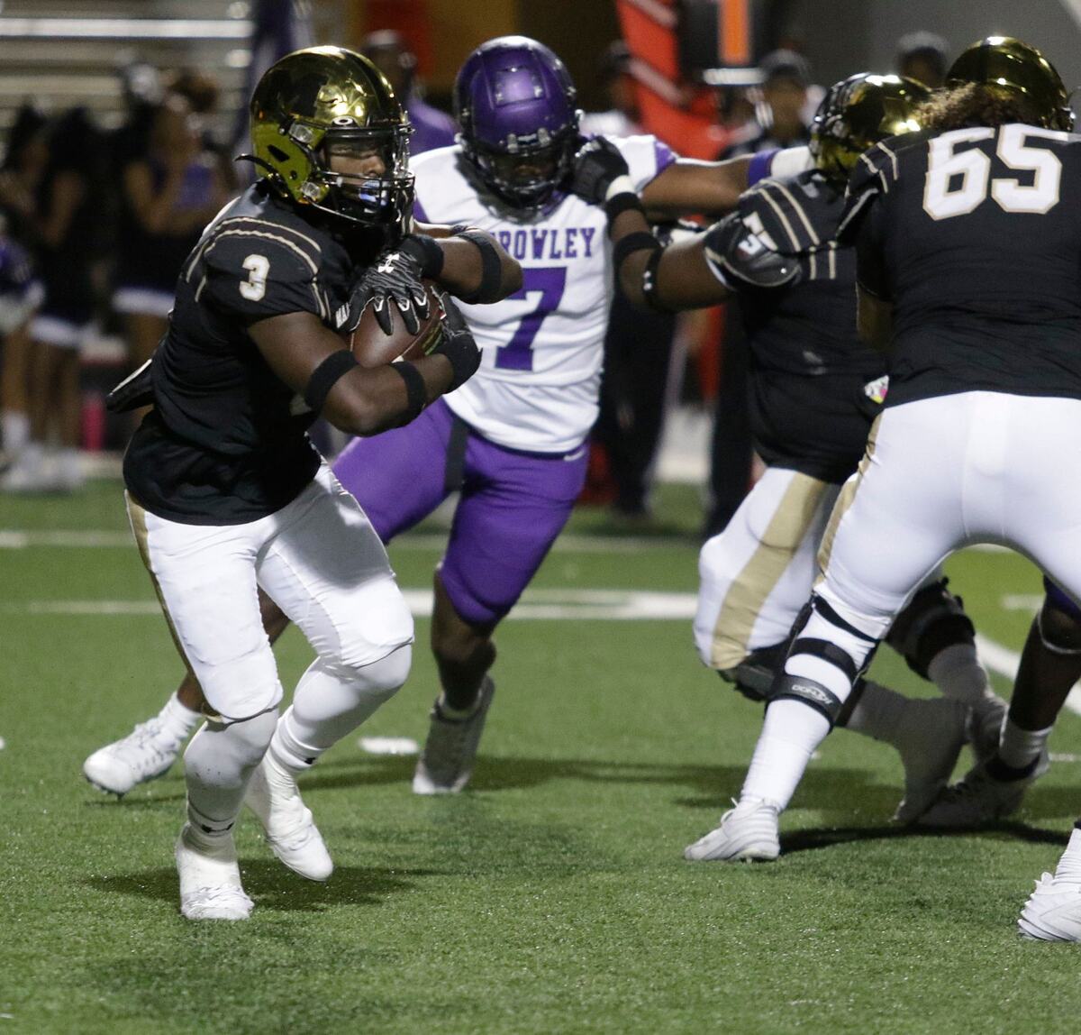 Mansfield’s Teddy Clark looks for running room during a UIL football game at Newsome Stadium on Saturday , October 10, 2024.