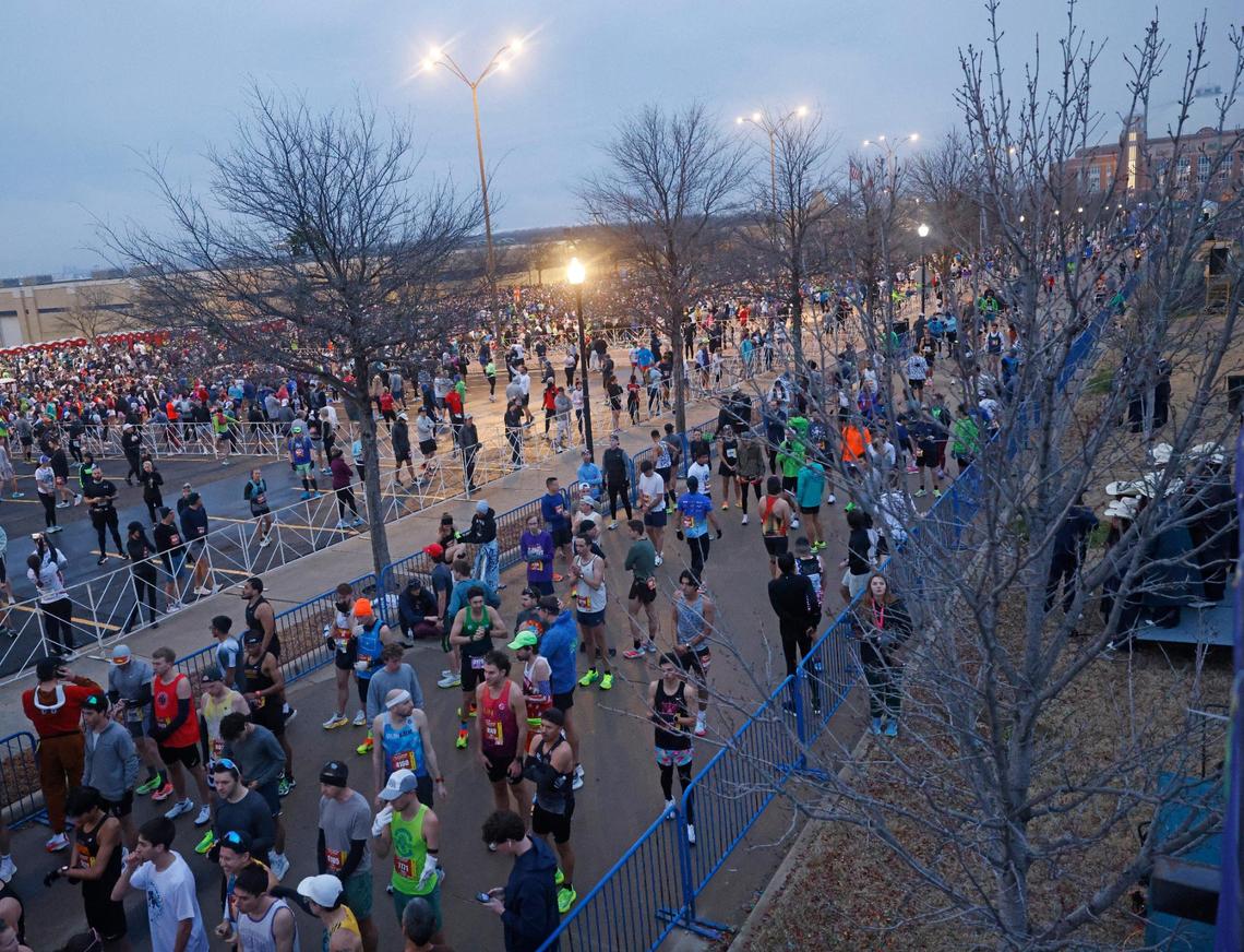 Runners in the first corral line up to start the 2025 Cowtown at the Will Rogers Memorial Center in Fort Worth, Texas, Sunday, Feb. 23, 2025.