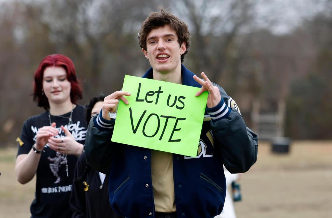 Keller High sophomore Heath Schiflett walks out with fellow Keller ISD students on Friday, Feb. 7, to protest the proposed split of the school district.