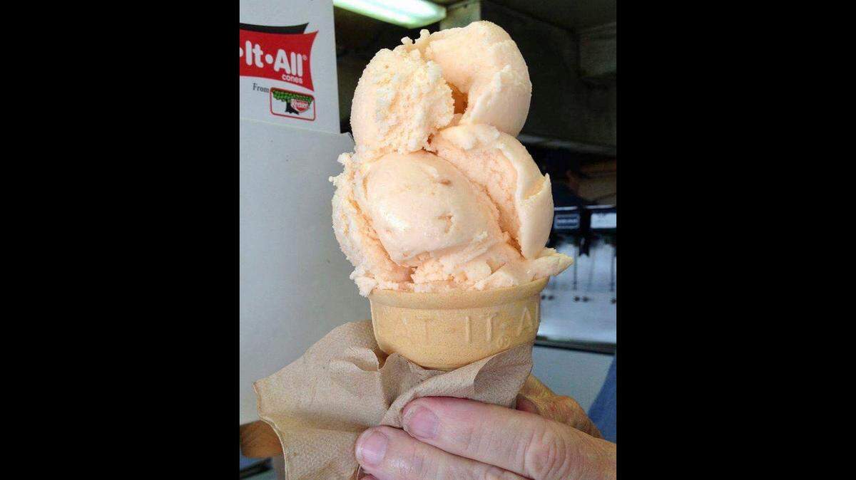 Homemade peach ice cream is one of nine flavors year-round at The Malt Shop in Weatherford.