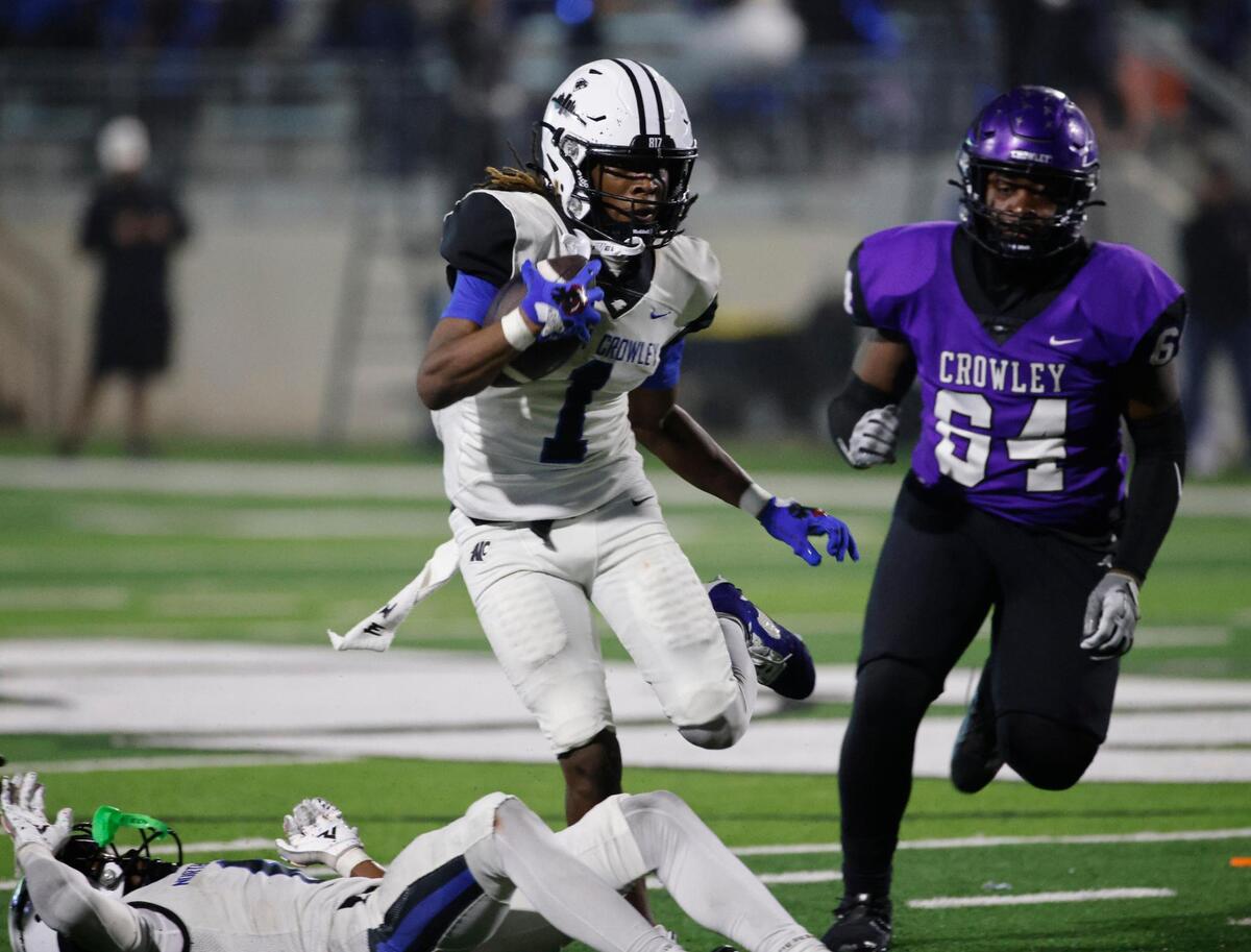 North Crowley running back Cornelius Warren (1) hurdles wide receiver Quentin Gibson (6) with Crowley defensive end Zhirazheon Pullen-Parmes (64) in pursuit during a UIL District 3-6A football game at Crowley ISD Multi-Purpose Stadium in Fort Worth, Texas, Thursday, Nov. 07, 2024.