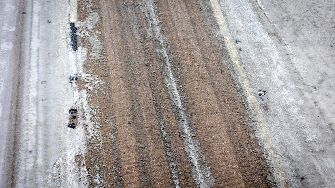 The Latest: Dallas-Fort Worth road conditions improve as ice melts Friday afternoon