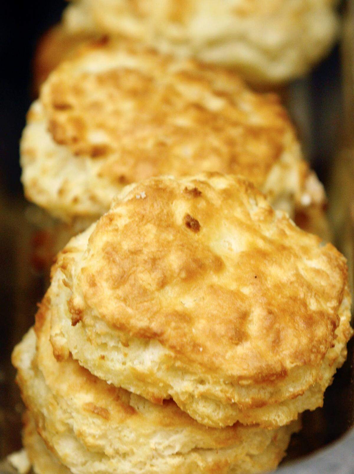 Stacks of warm fresh Rise biscuits at the south Durham, North Carolina location. The shop makes 800-1,000 biscuits every morning.