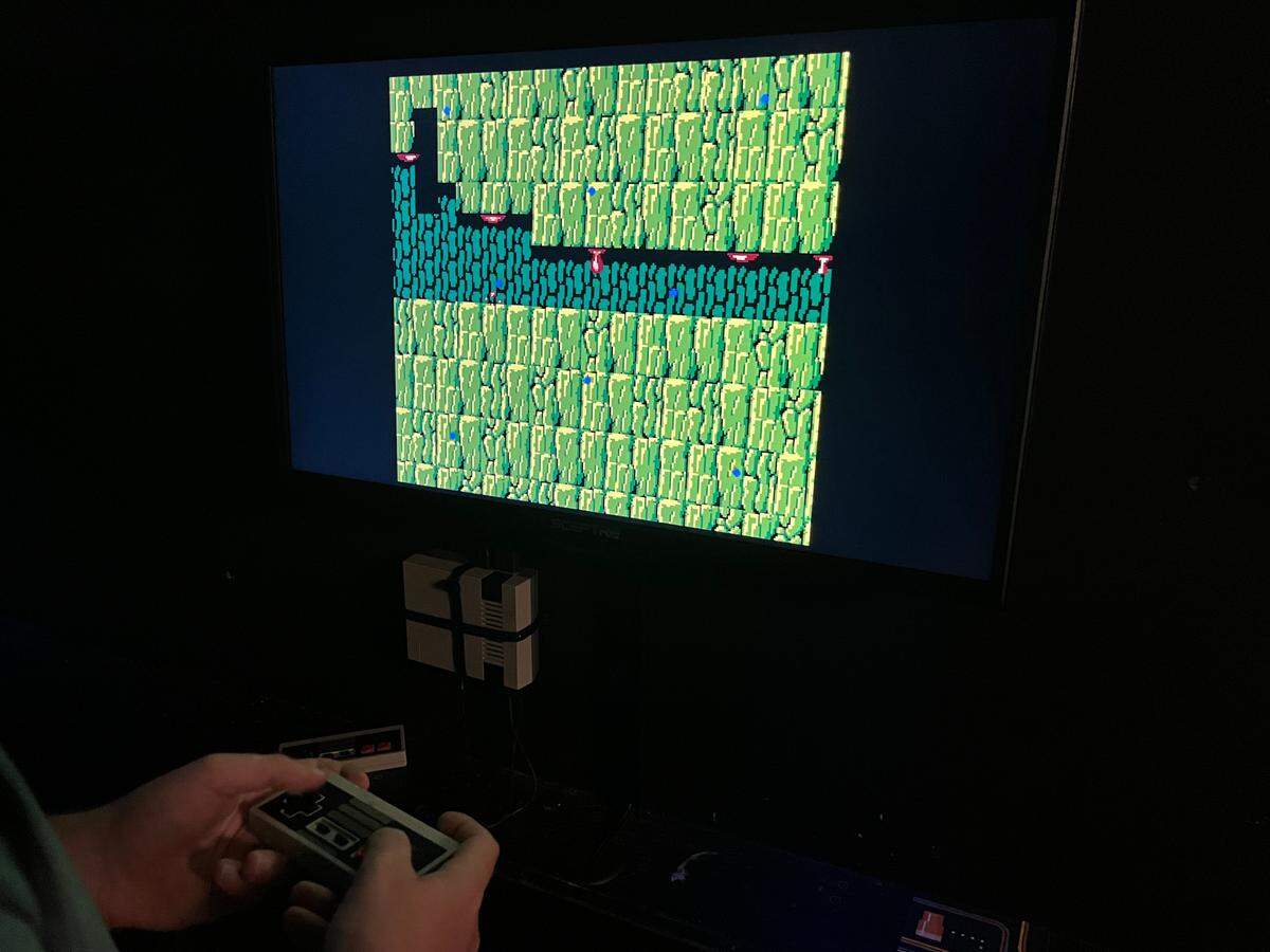 Vintage Nintendo computer game with the original controllers at Free Play arcade in Fort Worth.