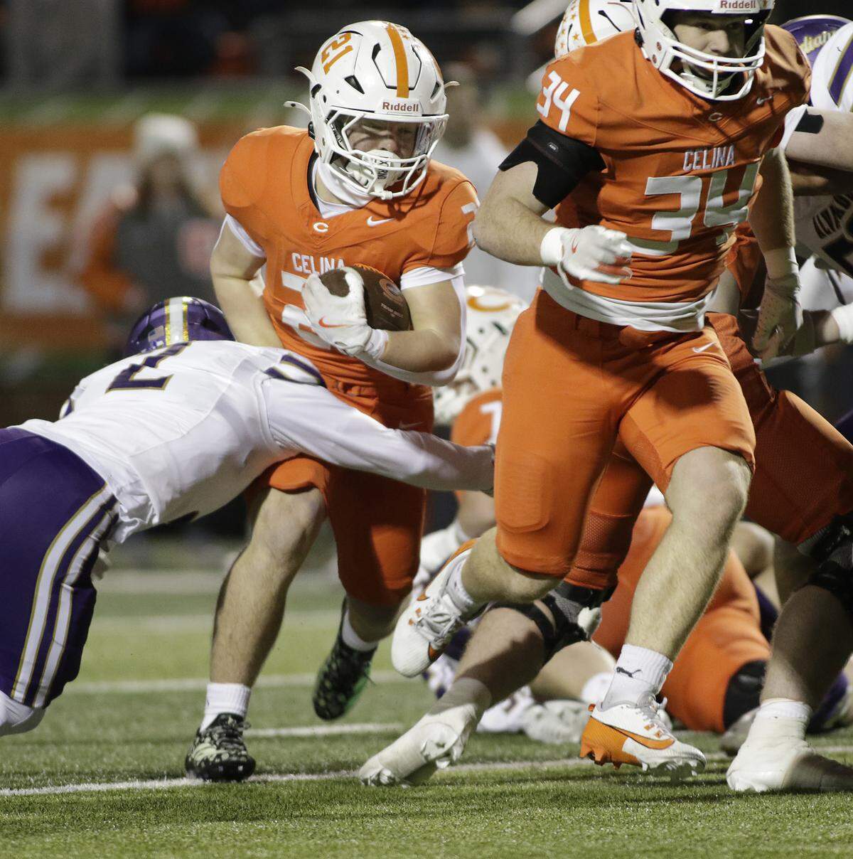 Celina’s Evan Koehne breaks a tackle during their Class 4A Division I quarterfinal game at Newsom Stadium against Alvarado on Friday, December 5, 2025, in Mansfield, Texas.
