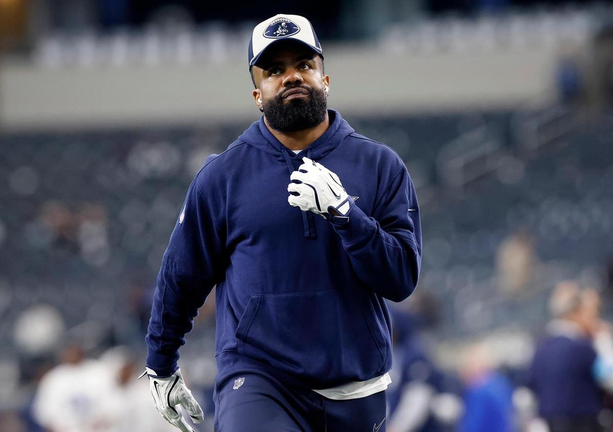 Dallas Cowboys running back Ezekiel Elliott warms up before the start of the NFL game against the New York Giants on Thursday, Nov. 28, 2024, at AT&T Stadium in Arlington.