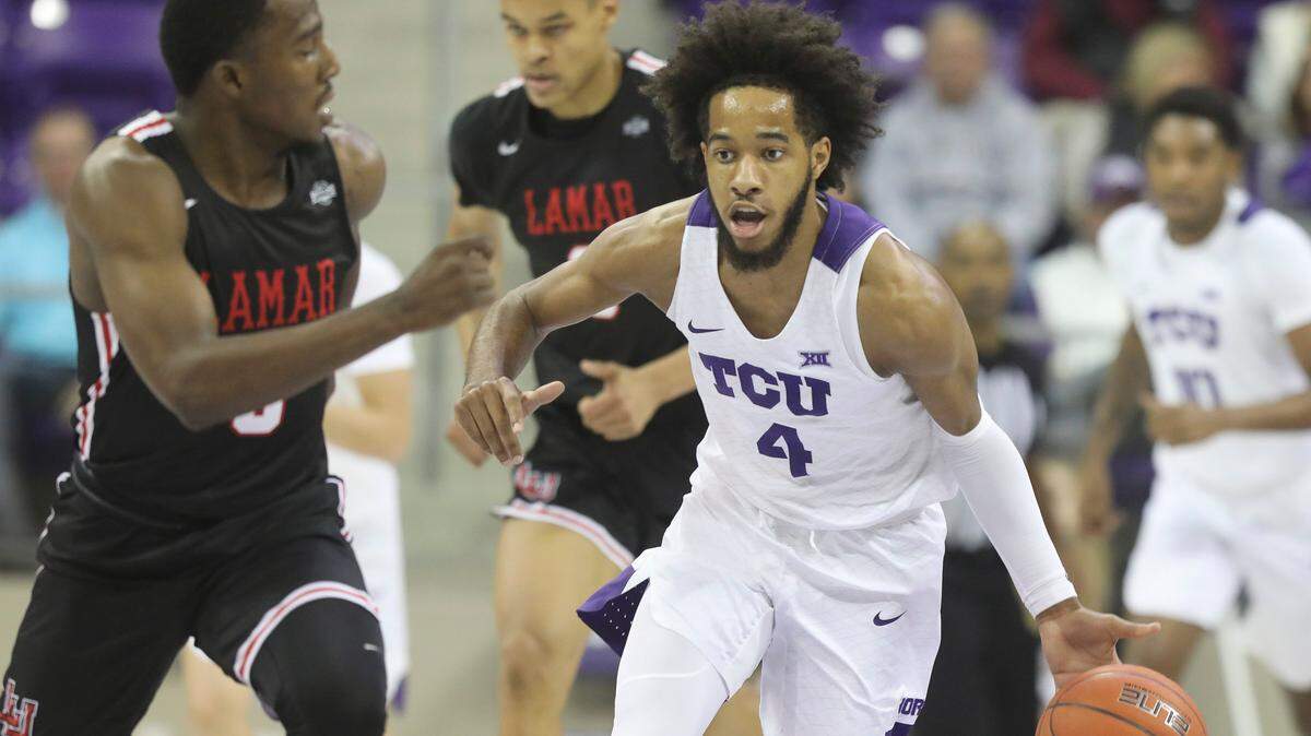 TCU guard PJ Fuller (4) brings the ball downcourt, defended by Lamar guard Ellis Jefferson (3), in the first half of an NCAA basketball game at Schollmaier Arena in Fort Worth, Texas, Saturday, Dec. 14, 2019.
