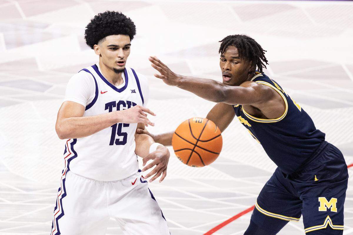 TCU forward David Punch (15) passes the ball in the second half of a NCAA basketball game between the TCU Horned Frogs and the Michigan Wolverines at Schollmaier Arena in Fort Worth on Friday, Nov.14, 2025.