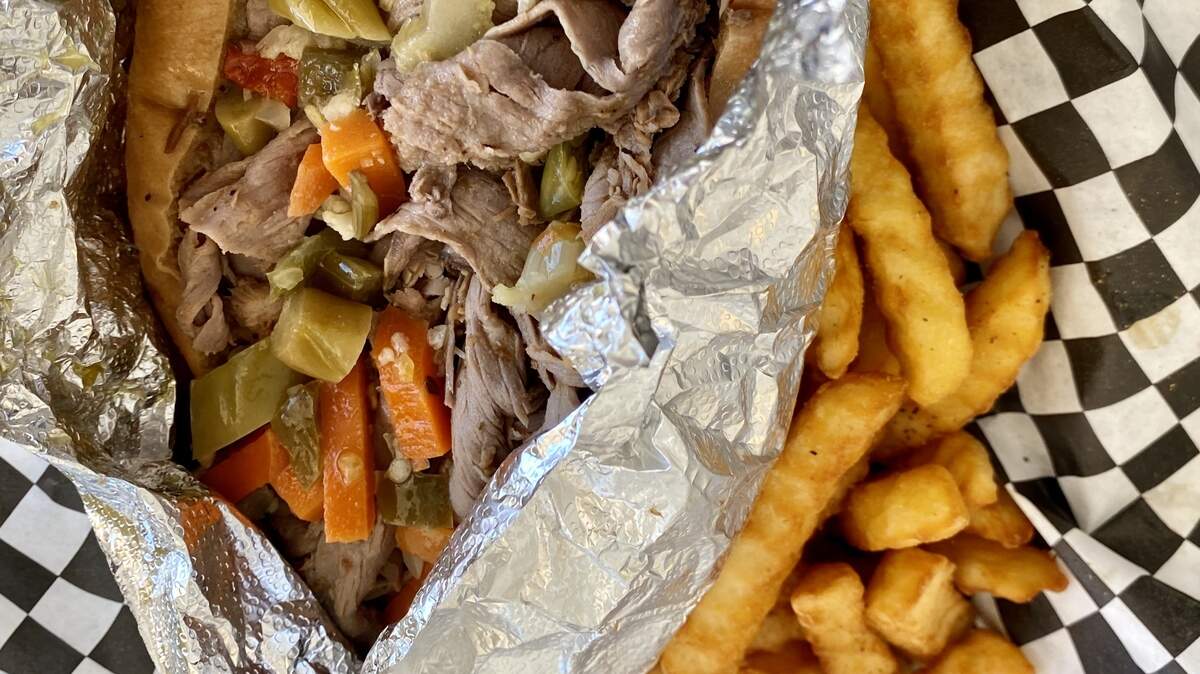 An Italian beef sandwich “wet,” with hot giardiniera relish at Hershey’s in Arlington. (Bud Kennedy/Star-Telegram)