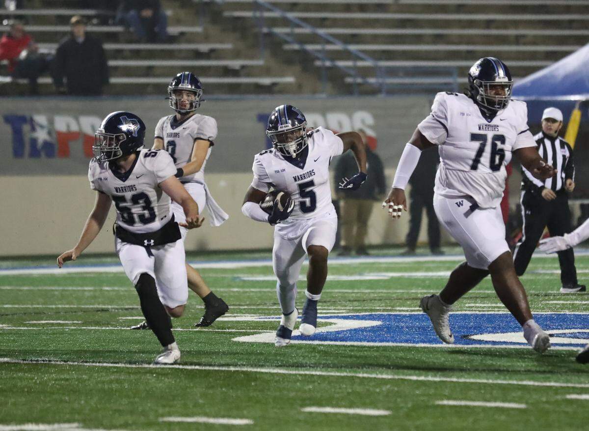 Liberty Christian’s Chase Garnett carries the ball at Waco ISD Stadium in Waco, Texas, on Saturday, Dec. 7, 2024.