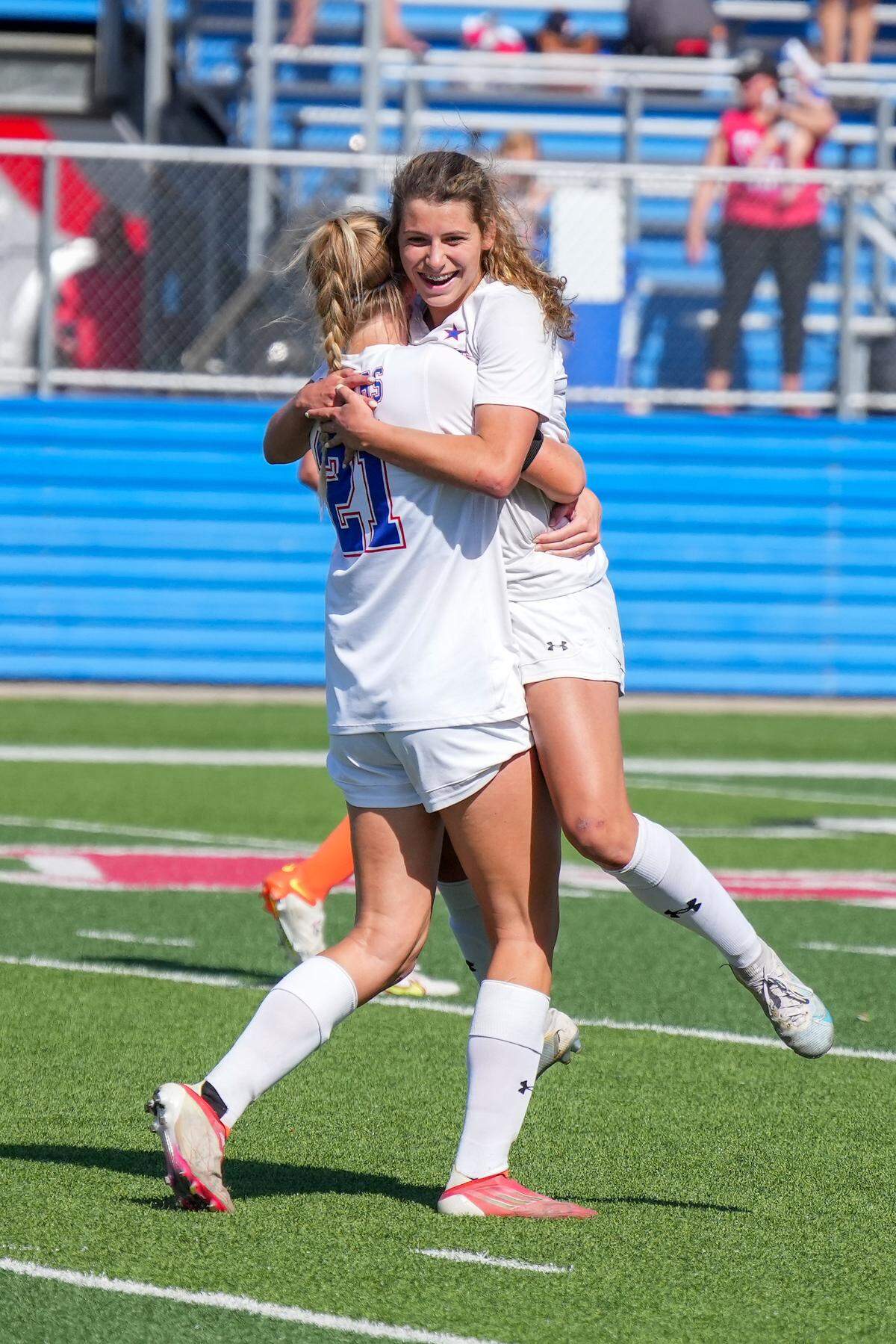 Midlothian Heritage’s Joely Godfrey and Jules Burrows celebrate a goal during the 4A state final vs. Celina (Ken Murphy/MaxPreps)