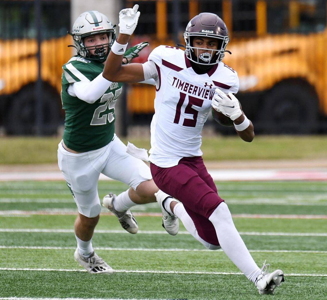Manfield Timberview’s Titus Evans returns a punt past Frisco Reedy’s Brody Tenant in the first quarter of Friday’s November 25, 2022 5A Division 1 Regional playoff football game at Pennington Field in Bedford, Texas. Special/Bob Haynes