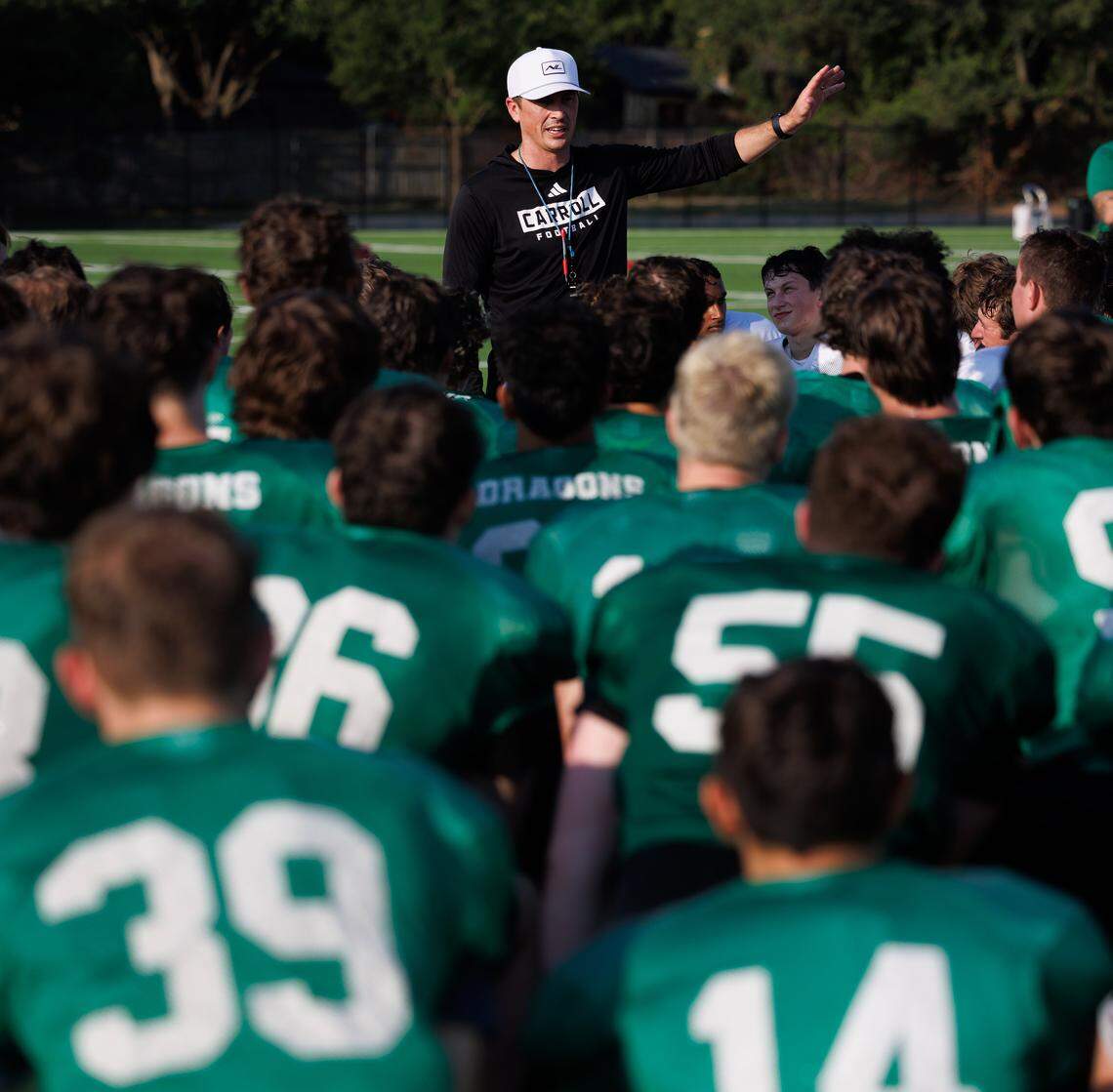 Southlake Carroll football coach Riley Dodge talks to his players during morning practice on Wednesday, Aug. 6, 2025, in Southlake.