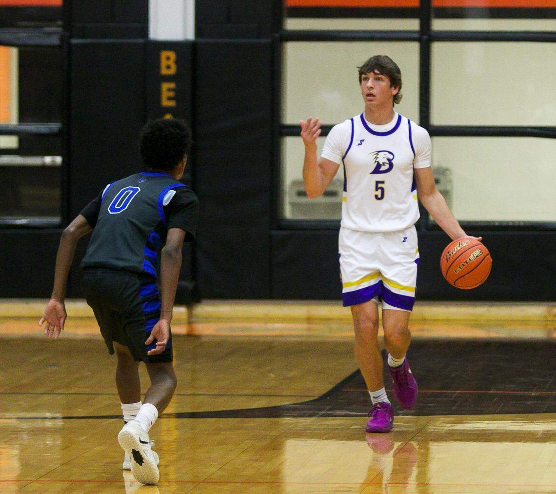 Brock’s Colt Matlock (5) brings the ball up court guarded by Fort Worth Dunbar’s Josiah Williams in a Class 4A Division II area-round playoff game on Thursday, February 26, 2026 at Aledo High School in Aledo, Texas.